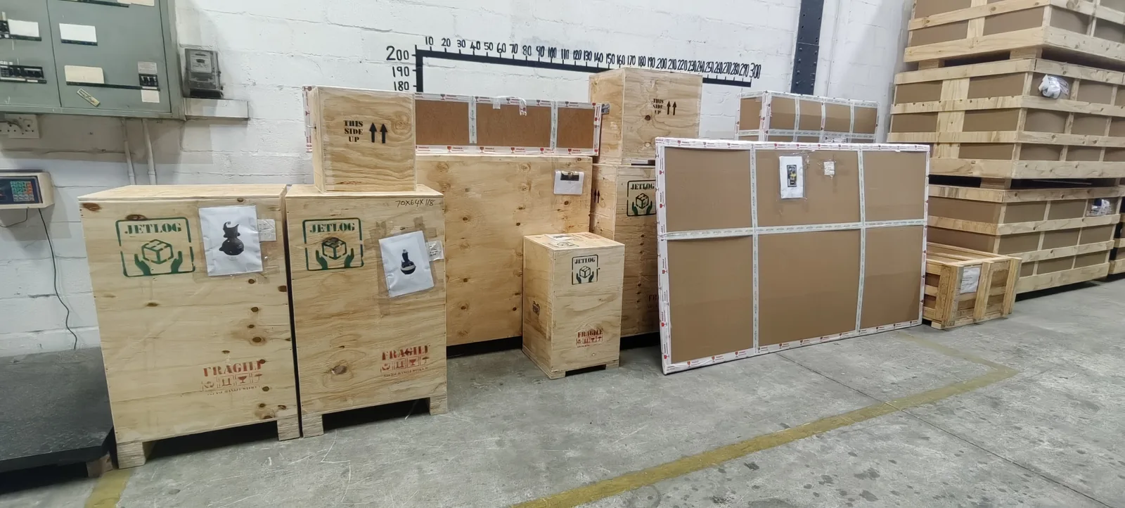 Range of custom JLog timber export crates for designer furniture in the Woodstock, Cape Town warehouse